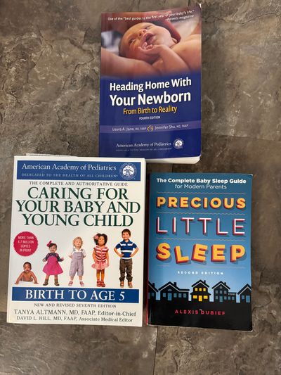three books: Heading Home With Your Newborn, Caring for your Baby and Young Child, and Precious Little Sleep